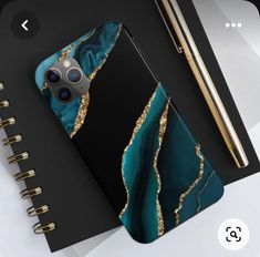 the phone case is designed to look like it has gold and blue paint on it