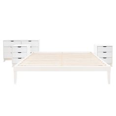 a white bed frame with drawers on each side and two nightstands next to it