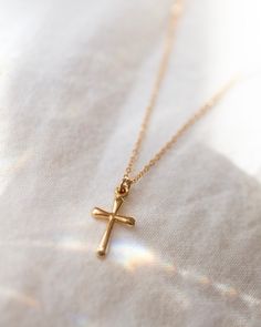 *on back order will ship mid January. Gold filled Cross Necklace, Simple Cross Necklace, Gold cross, Dainty cross jewlery, gift for her, necklaces for women DETAILS & MATERIALS: * 15 x 8 mm Cross Pendant * High Quality Gold filled  ■ SHIPPING UPGRADES You can find shipping upgrades options in the drop bar menu when you check out. * Within the U.S Regular First-class : 2-6 business days Priority : 2-3days Express : 1-2 days * International International Priority : 6-10 Business days Rush Internat Simple Cross Necklace, Cross Necklace Simple, Dainty Cross Necklace, Cross Gift, Simple Cross, Gold Rings Simple, Gold Cross Necklace, Jewelry Accessories Ideas, Gold Cross Pendant