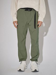 Editor's NoteOFFGRID's Ultimate Cordura Pants are made out of nylon and polyurethane fabric that has a high quality texture and structure. It can be styled as a set-up with Ultimate Cordura Packable Jacket. With adjustable string on the hem, you can easily adjust the silhouette, and can be worn by both male and female.- Belt on the waistline- String and Stopper on the hem- Straight silhouette- Wrinkle proof fabric Measurements (in.)S/M/L/XL/XXL- Length: 39.37 in / 39.96 in / 40.55 in / 40.94 in / 41.34 in- Waist: 13.39 in / 14.37 in / 15.35 in / 16.34 in / 17.32 in- Hip: 19.29 in / 20.28 in / 21.26 in / 22.24 in / 23.23 in- Thigh: 12.80 in / 13.29 in / 13.78 in / 14.27 in / 14.76 inModel info: Male - 5'10 Wearing size L, Female - 5'7, Wearing size SComposition & Care- Nylon 94% Po Green Nylon Parachute Pants With Relaxed Fit, Green Nylon Long Pants, Functional Nylon Pants With Belt Loops, Sporty Nylon Cargo Pants With Belt Loops, Nylon Outdoor Pants With Belt Loops, Nylon Pants With Belt Loops For Outdoor Activities, Nylon Pants With Belt Loops For Outdoor, Nylon Parachute Pants With Belt Loops For Outdoor Activities, Functional Khaki Nylon Bottoms