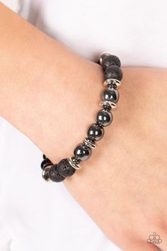 Infused with a section of polished black beads, a stellar assortment of gunmetal beads, silver accents, and black lava rock beads are threaded along stretchy bands around the wrist for an urban flair.   Sold as one individual bracelet.  2/8/21 Lava Rock Bracelet, Urban Jewelry, Lava Bracelet, Oil Spill, Black Bracelet, Bracelet Online, Black Bracelets, Lava Rock, Paparazzi Accessories