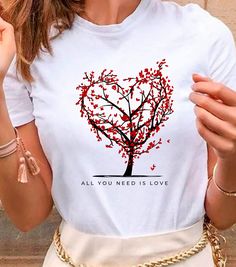 Beautiful tree shirt with a beautiful phrase. *ABOUT OUR SHIRT*¨ -100% Airlume combed and ringspun cotton (fiber content may vary for different colors) -Light fabric (4.2 oz/yd² (142 g/m²) -Runs true to size ¨*WASH/CARE INSTRUCTIONS*¨ -Wash before use. -Inside out, wash with delicate cycle. -Wash with cold water. -Do not bleach. -Do not iron directly onto the design. -Do not dry clean. ¨*HOW TO ORDER*¨ -Before you place the order, please review all the information. -Select the garment SIZE and garment COLOR. -Select the quantify. -Click Add to Cart. -For multiple items go back to the listing and repeat the steps. Thank you for trusting us!. Summer Gift T-shirt With Text Print, Red T-shirt For Summer Gift, Summer Heart-shaped Letter Print T-shirt, Casual Cotton T-shirt For Valentine's Day, Casual Red T-shirt For Gift, Spring Shirt With Letter Print For Gifts, White Shirt With Heart Graphic As Gift, Summer Letter Print Shirt As Gift, Summer Letter Print Shirt Gift