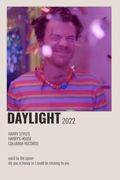 the poster for daylight shows a man with glasses and a striped shirt smiling at the camera