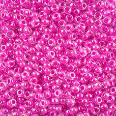 bright pink beads are shown in this close up photo