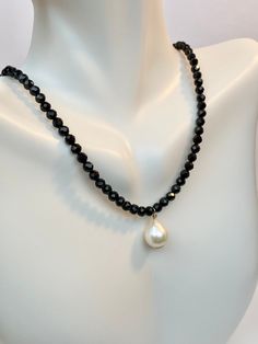 Beautiful choker necklace with freshwater Pearl and natural Black spinel gemstones Beautiful and Classic look. Perfect gift for any occasion Holidays, Birthday or just something nice as a gift for her. Everyday choker necklace for girls, mommy and daughter gift idea, Valentine's Day gift ◈ Handmade to order ◈ Freshwater pearl: about 9.5x12mm ◈ Black spinel: 4mm natural gemstone round shape, sparkle as much as black diamond ◈ 14k gold filled claps and one inch extension free USA shipping A little Black Beaded Necklace With Pearl Charm As Gift, Black Beaded Necklaces With Pearl Charm Gift, Gift Black Beaded Necklaces With Pearl Charm, Minimalist Black Pearl Drop Jewelry, Black Pearl Drop Necklace For Gift, Minimalist Black Pearl Necklace With Pendant, Black Minimalist Jewelry With Pearl Charm, Minimalist Black Jewelry With Pearl Charm, Elegant Black Beaded Necklace For Everyday