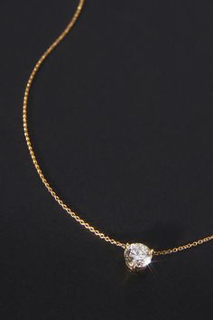 Made with 14k, 18k, and 24k gold, this only-at-Anthro collection is designed with everyday wear in mind. Whether working out, running errands, or heading to dinner, these made-to-last pieces add a glimmer of luxury to every look. | Single Floating Diamond Necklace by Anthropologie in Gold, Women's Womens Diamond Necklace, Floating Diamond Necklace, Running Errands, Diamond Necklace, Everyday Wear, Floating, Gold Necklace, Gold, How To Wear