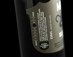 a bottle of wine is shown on a black background