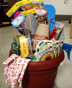 a red bucket filled with lots of different items