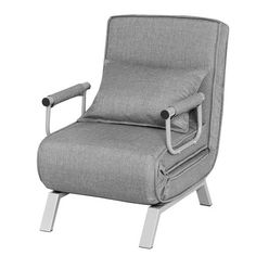 a gray chair sitting on top of a white floor next to a metal leg rest