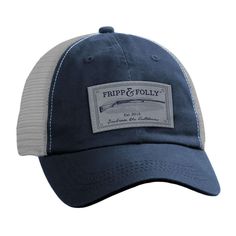 a blue and white trucker hat with the words trip & polly on it