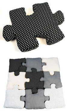 four pieces of puzzle sitting on top of each other