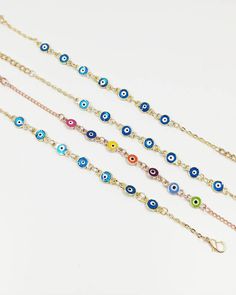 Evil Eye Bracelet is adjustable, it comfortably fits on any wrist. Evil eyes are believed to protect the person who carries them. Evil eye charms are also believed to bring good luck and deflect the negative energy. This Evil eye beaded bracelet can be a perfect gift. There are 7 Evil eye beads on this Turkish Eye Bracelet. For more evil eye bracelets, click the link below; https://www.etsy.com/shop/EyeDesignsbyGG?ref=search_shop_redirect&section_id=30219689 Adjustable Multicolor Chain Bracelet, Multicolor Bracelets With Adjustable Chain And Round Beads, Adjustable Metal Evil Eye Bracelet, Adjustable Round Chain Bracelet With Evil Eye, Adjustable Metal Evil Eye Charm Bracelet, Colorful Evil Eye, Evil Eye Beaded Bracelet, Gold Evil Eye Bracelet, Minimal Bracelet