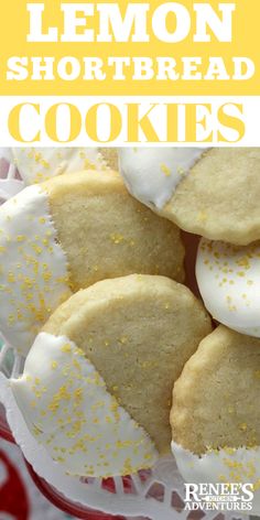 lemon shortbread cookies with white frosting and sprinkles in a basket