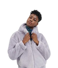 Feel the buttery soft coziness on a cold day by wearing UGG® Mandy Faux Fur Hoodie II. The hoodie features an attached hood, in-seam side pockets with soft fleece lining, and center-front zipper closure. The YKK® zipper and UGG® logo metal zipper pull make it a perfect reflection of the brand style..All polyester..Machine wash cold, tumble dry low..Imported. Super Soft Cozy Winter Outerwear, Cozy Super Soft Winter Outerwear, Super Soft Hooded Fleece Outerwear, Super Soft Hooded Outerwear For Fall, Comfy Hooded Outerwear With Soft Texture, Cozy Super Soft Hooded Outerwear, Super Soft Hoodie For Fall, Soft Hooded Fall Outerwear, Soft Hooded Winter Outerwear