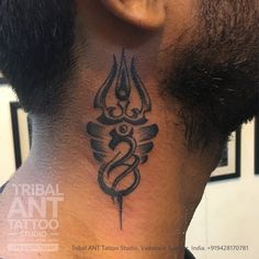 a man with a tattoo on his neck