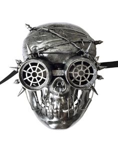 Pirate meets steampunk with this wicked looking full face copper mask. This mask features a bandana with barbed wire across the top. Glasses with cogs in the center and spikes around the sides of the lens. Wire coils going down the sides of the jaw and metal looking staples across the mouth. Each mask comes with black ribbons to tie. **Available in individual, 3-pack, 6-pack or 12-pack pricing** Explore All Steampunk Masquerade Masks Punk Style Eye Mask For Costume Party, Punk Full Face Masks For Costume Party, Steampunk Masks And Prosthetics For Costume Party, Futuristic Masks And Prosthetics For Halloween Masquerade, Punk Adjustable Masks And Prosthetics For Halloween, Steampunk Mask For Costume Party, Gothic Masks For Halloween Festival, Punk Halloween Adjustable Masks And Prosthetics, Punk Full Face Mask For Halloween