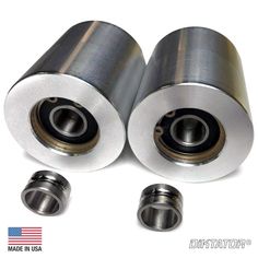 two metal rollers with one bearing on each side and the other bearing on top