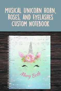 a notebook with the words musical unicorn horn, roses and eyelashes custom notebook on it