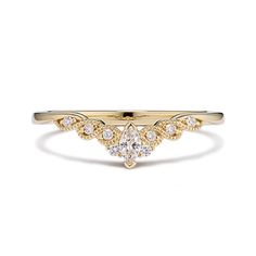 a yellow gold and white diamond ring