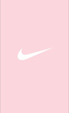 a white nike logo on a pink background