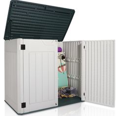 an outdoor storage shed with the door open