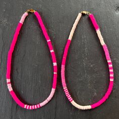 Limited edition pinktastic heishi bead necklace will have you feeling like a doll! Perfect for lounging at your Malibu Dream House or cruising in a pink convertible. 17 inches long 6mm soft vinyl and gold-plated Heishi beads Libby & Smee exclusive style Malibu: bright pink and baby pink Malibu Beach: bright pink, peony pink and pale blush flexible heavy-duty beading wire gold-plated lobster claw closure, crimps, crimp covers (lead-free and nickel-free) all Libby & Smee beaded necklaces come pack Adjustable Pink Heishi Beads, Pink Heishi Beads Necklace With Tiny Beads, Pink Heishi Beads Necklace, Adjustable Single Strand Pink Beaded Necklace, Pink Single Strand Bohemian Beaded Necklaces, Bohemian Pink Single Strand Beaded Necklaces, Pink Bohemian Single Strand Beaded Necklaces, Pink Tiny Beads Necklace For The Beach, Pink Heishi Beads Necklace For Gift