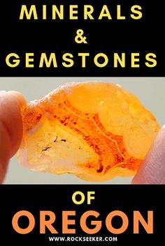 a hand holding an orange object with the words minerals and gemstones of oregon on it