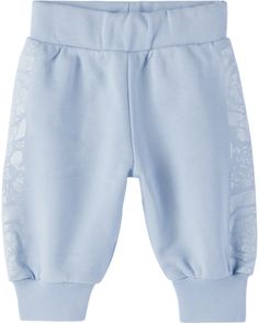 French terry sweatpants. · Rib knit elasticized waistband · Single-pocket styling · Rib knit cuffs · Graphic pattern printed at outseams · Machine-wash Supplier color: Light blue/White Versace Size : child's height 0/3M: 22 / 56 cm 3/6M: 24.5 / 62 cm 6/9M: 27 / 68 cm 9/12M: 29 / 74 cm 12/18M: 31.5 / 80 cm 18M: 34 / 86 cm 18/24M: 34 / 86 cm 24M: 36 / 92 cm 36M: 38.5 / 98 cm Blue Sweats With Elastic Waistband For Winter, Blue Winter Sweats With Elastic Waistband, Blue Cotton Sweatpants With Ribbed Cuffs, Casual Blue Bottoms With Logo Waistband, Blue Cotton Pants With Ribbed Cuffs, Blue Bottoms With Ribbed Cuffs For Winter, Blue Winter Bottoms With Ribbed Cuffs, Blue Jogging Bottoms, Blue Bottoms With Elastic Cuffs For Loungewear