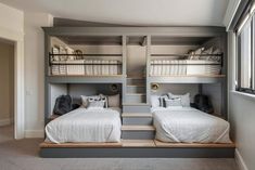 two beds in a room with bunk beds on the bottom and second bed on the top