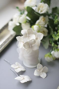 White Bridal Hair pin White Wedding hair pin Hydrangea Hair piece Bridal flower hair Flower Bridal headpiece Bridal accessories 1 item- 1 hair pin! Hydrangea flowers made from Japanese air dry clay. Flowers are gentle, realistic, and require careful handling. These flowers won't wilt, brown or fade and no need to water them. It was about 2-2,5 cm in diameter. You can choose your own color. Delivery takes about 1 -1.5 week within Europe, 2 week - USA and more countries. Please avoid contact with White Wedding Hair, Hair Pins Bridal, Flower Hair Pins, Wedding Barrettes, Headpiece Bridal, Hydrangea Flowers, Bridal Flower, Bridal Hair Flowers, Hair Flower