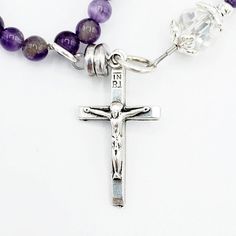 This handmade magnetic closure rosary bracelet is made with 4mm natural amethyst beads, 6x8mm rondelle crystals, and Tibetan silver bead caps featuring a 1 inch silver-tone cross and 10mm Miraculous Medal bead. All other findings are silver plated. All rosary parts are made in Italy. This bracelet is ~8 inches long. Each bracelet in my shop is handmade by yours truly. And I back all of my work with a 100% satisfaction guarantee. If you are not completely satisfied, please contact me directly and Rosary Bracelet, Miraculous Medal, Amethyst Beads, Have A Blessed Day, Photo Bracelet, Bead Caps, Rosary, Silver Beads, Silver Tone