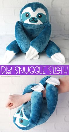 a stuffed slotty sitting on top of a person's hand with the word diy smugle sloth