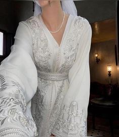 Moroccan White Caftan, White Luxury Embroidered Wedding Dress - Bridal Gown with Intricate Details, Romantic Elegance, Handcrafted Beauty, Floral Embroidered V-neck Wedding Gown, Elegant Gown With Intricate Embroidery For Wedding, Elegant Embroidered Gown For Wedding, White Embroidered Dress For Ceremony, White Floor-length Gown For Ceremony, Traditional White Ceremonial Dress, Ceremony White Dress With Intricate Embroidery, White V-neck Wedding Dress, Elegant Floor-length Wedding Dress With Intricate Embroidery