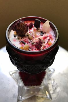 a dessert in a glass bowl on a table