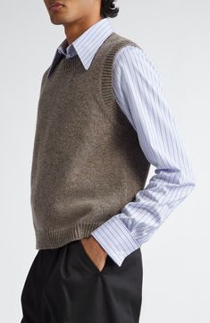 Soft Italian wool offers luxe warmth and comfort in this marled sweater-vest featuring a signature four-stitch moniker at the nape. Crewneck Ribbed cuffs and hem 100% wool Dry clean Made in Italy Designer Clothing Classic Beige Wool Sweater Vest, Fitted Wool Sleeveless Sweater Vest, Classic Brown Wool Sweater Vest, Luxury Brown Wool Vest, Margiela Sock Sweater, Marled Sweater, Fabric Gift Bags, Nordstrom Store, Wool Sweater