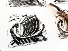 three different types of ink on paper with a stamper next to one that has an image of a boat in the water