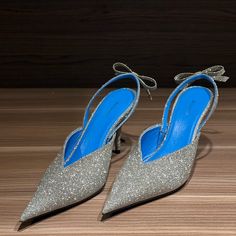 Like New, Worn 2 Times Sparkling Slingback Pumps For Party, Party Slingback Pumps With Branded Open Heel, Party Slingback Pumps With Branded Heel Counter, Luxury Slingback Pumps For Spring Party, Luxury Spring Slingback Pumps For Party, Formal Glitter Slingback Pumps With Pointed Toe, Glamorous Glitter Slingback Pumps For Evening, Glitter Slingback Pumps With Pointed Toe For Party, Party Slingback Pumps With Glitter And Pointed Toe