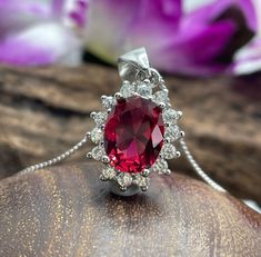 * Center Stone Details: - ↣Stone- Lab Simulated Ruby ↣Shape - Oval ↣Weight - 2.00 CT Approx. ( 9*7 mm ) ↣Color- Dark Red ↣Clarity- VVS ↣Cut- Excellent ↣Making Process - Handmade by Skilled Craftsmen. Note- All the Product have excellent Sparkle Camera does not make justice to it. * Other Stone Details :- ↣Stone- Moissanite ↣Shape - Round ↣Weight - 0.20 CT Approx. ( 1.15 mm ) ↣Color- Colorless ↣Clarity- VVS ↣Cut- Round Note- {Customization Available} * Pendant Details: - ↣Brand- One Soul Jeweller Dazzling Wedding Necklace With Center Stone, Dazzling Wedding Necklaces With Center Stone, Red Oval Cubic Zirconia Necklace, Wedding Cubic Zirconia Necklace With Accent Stones, Wedding Jewelry With Oval Pendant Center Stone, Wedding Cubic Zirconia Necklaces With Accent Stones, Wedding Necklaces With Cubic Zirconia Accent Stones, Red Prong Set Necklace For Wedding, Wedding Necklace With Diamond Accent Stones