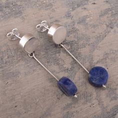 Taking inspiration from the singular style of Spanish artist Joan Miro Peruvian artisan Leslie Granthon creates these fantastic earrings. The dangle earrings are made from polished Andean sterling silver and accented with off-center discs of natural blue sodalite. Modern Blue Earrings With Natural Stones, Blue Sodalite, Joan Miro, Earring Crafts, Bracelet Crafts, Wire Earrings, Jewelry Packaging, High Point, Jewelry Gift Box