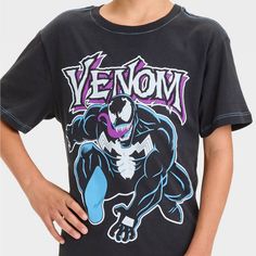 Upgrade your kid's wardrobe with this Venom Short-Sleeve Graphic T-Shirt. Made of 100% cotton, this mid-length T-shirt features a graphic of the iconic character Venom. Tailored in a standard fit, this graphic tee is designed with a banded collar neckline and short sleeves for a classic look. Plus, the pullover style makes it easy to wear. Venom T Shirt, Trending Graphic Tees, Kids Wardrobe, Kids Clothes Boys, Top Graphic Tees, Boys Long Sleeve, Band Collar, Iconic Characters, Venom