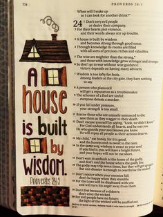 an open bible with a house is built by wilson proves 3 9 on it