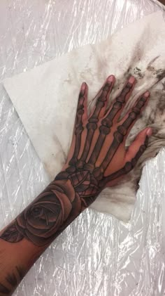 a person's arm with a tattoo on it