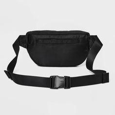 From day trips to running errands, breeze through your day in comfort and style with this Athleisure Fanny Pack from A New Day™. This fanny pack features a soft shell made from 100% recycled polyester, and it features a single zippered compartment for stashing small essentials such as your wallet, phone or car keys. It's designed with one interior and one exterior zip pocket and a back slip pocket to offer you more storage space, and with an adjustable strap with a clasp closure, you can easily Casual Belt Bag With Functional Pockets For Outdoor, Sporty Nylon Belt Bag For Sports, Casual Outdoor Belt Bag With Adjustable Strap, Sporty Belt Bag With Pockets For Outdoor Activities, Casual Nylon Belt Bag For Outdoor Activities, Sporty Belt Bag For Outdoor Activities, Casual Sports Belt Bag With Pockets, Casual Nylon Belt Bag For Everyday, Black Nylon Belt Bag For Sports