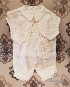 "Ivory Color 3 pieces Baby Boy Christening Outfit It is perfect for both baptism or blessing -Jumper -Sash -Hat Measurements 9-12 months, Jumper (waist 10\", long Shoulder to Hem 20\") 12-18 months, Jumper (waist 11\", long Shoulder to Hem 22\") 18-24 months, Jumper (waist 11.5\", long Shoulder to Hem 24.5\") Please check the measurements, and any questions send me a message, your satisfaction is very important for me Comes with a suit bag Dry clean only" Cream Cotton Sets For Baptism, Traditional White Baptism Sets, Off White Baptism Dress For Summer, Cream Sets For Baptism In Summer, Elegant Beige Sets For Baptism, Elegant Beige Baptism Set, Cream Cotton Baptism Dress, Baby Boy Christening Outfit, Boy Christening Outfit