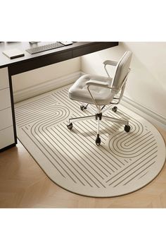 an office chair sitting on top of a white rug