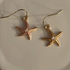 Starfish Earrings Made With Enamel. *One Set *Starfish 3/4” Star Shaped Earrings For Summer, White Star Earrings For Beach, Gold Star Earrings For Summer, Star Shaped Earrings With Star Charm For Beach, Star-shaped Earrings For Beach With Pierced Ears, Beach Earrings With Star Charm, Beach Star Charm Earrings, Ocean-inspired Star Earrings For Summer, Summer Earrings With Starfish Charm