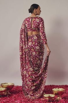 Maroon pre-draped saree with all over gardenia blossom print and hand embroidered detailing. Paired with a matching printed three fourth sleeves blouse. - Aza Fashions Saree Gowns, Dhoti Saree, Cotton Sarees Handloom, Draped Saree, Ruffle Saree, Drape Saree, Blossom Print, Sleeves Blouse, Lehenga Saree