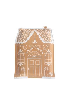 a brown and white gingerbread house shaped box