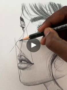 someone drawing a woman's face with pencils