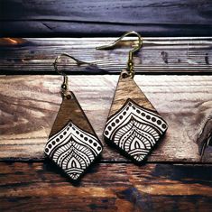 ✨ Embrace bohemian elegance with our handcrafted wooden earrings from The Wandering Path, adorned with intricate engravings and finished in crisp white paint. 🌼 Meticulously designed, each pair captures the essence of boho charm with detailed engravings highlighted by a clean and fresh white hue. 🌿 Perfect for those who seek a touch of bohemian sophistication in their accessories. 🎁 Gift these artisanal earrings to friends or keep them as a stylish expression of your love for boho-inspired be Bohemian Natural Wood Jewelry Gift, Bohemian Natural Wood Jewelry As Gift, Earring Gift, Birthday Gifts For Sister, Stocking Stuffer Gifts, Bohemian Design, Boho Designs, Wooden Earrings, Birthday Gift For Her